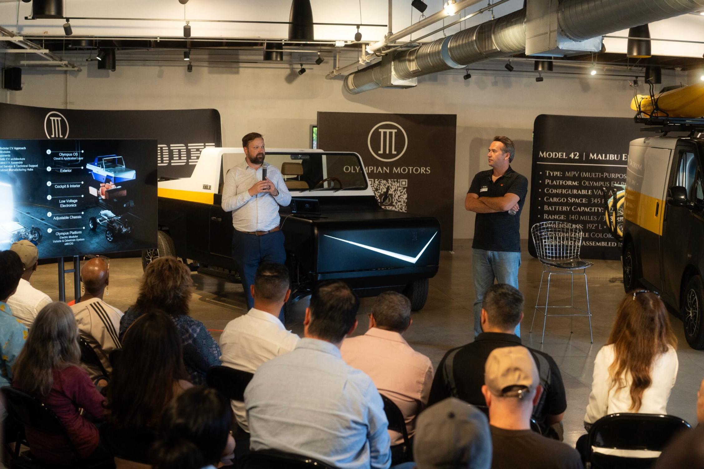 Guests meeting the Olympian Motors team at the Los Angeles roadshow
